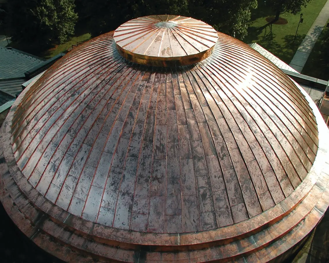 Craftsman Roofing crew installing a new roof in Brighton